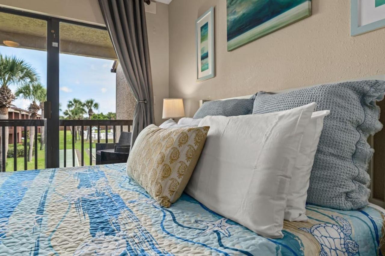 Experience Starlit Nights From Beach Happy's Balcony Overlooking The Community Pool At Beachwalk *